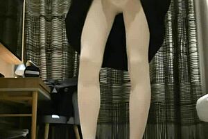 Transgender Femboy in Black Dress Performs Handjob