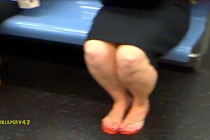 Red-Haired Milf Shows Off Sexy Legs and Feet