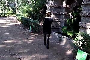 Why is she getting naked outdoors in barcelona's public park?