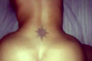 Blonde mature woman is bent over in a doggystyle position