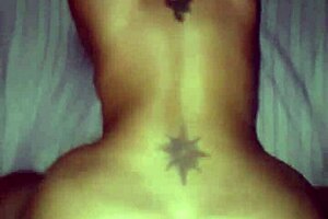 Blonde mature woman is bent over in a doggystyle position