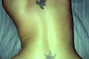 Blonde mature woman is bent over in a doggystyle position