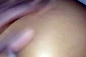 Does the ebony midget give blowjob during bench press?