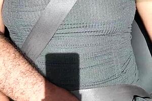 Latina flashing in moving car