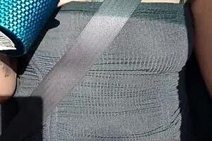 Latina flashing in moving car