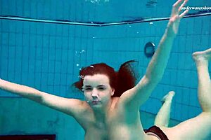 Hey, check out this underwater mermaid vesta as a horny teen 18+ splashing in the pool and beach with her bikini on, getting all wet in the shower too