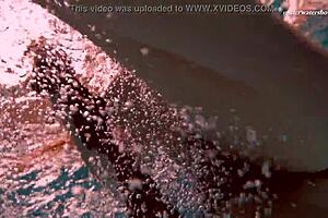 Hey, check out this underwater mermaid vesta as a horny teen 18+ splashing in the pool and beach with her bikini on, getting all wet in the shower too