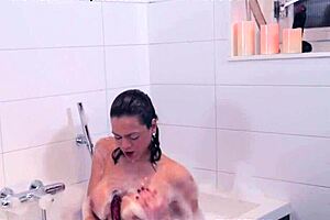 Solo Bathing Shemale Tugs Her Hard Shaft