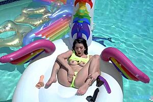 pixie riley jean gives blowjob to logan lucky by the pool.