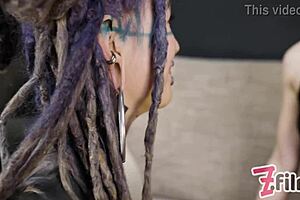 dominatrix in pet play controls tattooed cat-girl with anal butt plug