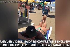 Enjoying beach time with husband and that bikini mark