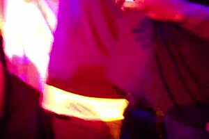 two girls perform on stage with a ciroc bottle in an amateur show