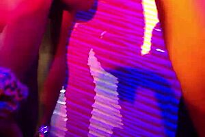 two girls perform on stage with a ciroc bottle in an amateur show