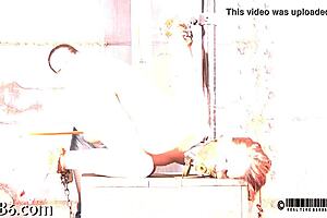 Intense whipping session for the willing gal.