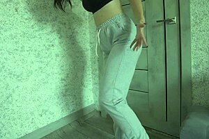 Petite teen pees in desperation, wet and horny.
