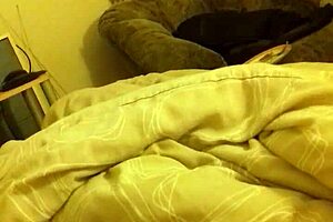 In the bedroom, he wanks his long thin cock to a massive cumshot