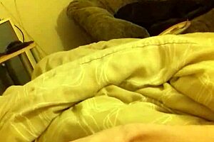 In the bedroom, he wanks his long thin cock to a massive cumshot