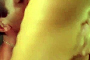 Two Women Share Man In Group Facial