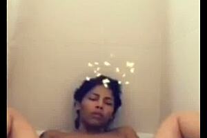 mulata paola masturbates in the bathtub and cums hard