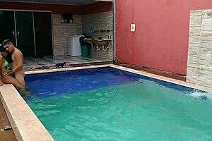 Caught The Pregnant Babe Bent Over In The Pool?