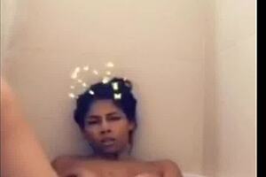 mulata paola masturbates in the bathtub and cums hard