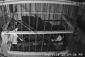 Intense cage bondage for gay slave, bound tightly in the cage