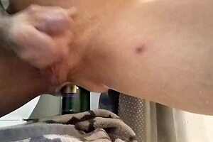 Gay bottom rides cock in ass with bareback action, tattoos, and piercings in group scene