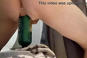 Gay bottom rides cock in ass with bareback action, tattoos, and piercings in group scene