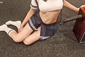 petite teen rides large toy energetically.