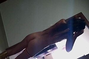 Risky naked dance on hotel corridors under CCTV?