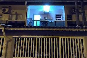 Young Married Woman Caught with Lover on Balcony
