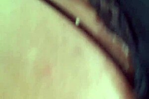 the girl in lingerie plays with dildos on her ass