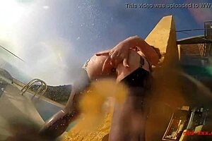 Sexy mature redhead masturbates by the pool