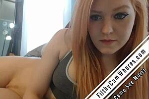 redhead nerd teases her tight pussy with a naughty buttplug toy