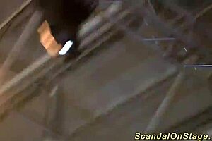 extreme babe squirts hard on public stage with big tits!