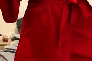 Brunette in red lingerie plays with herself