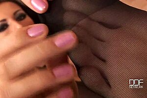 lora black shows off her stocking legs in solo pose