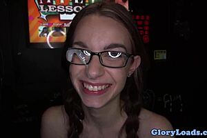 petite babe with glasses sucks cock at gloryhole up close