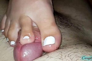Close up stepsister gives me a footjob