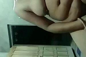 I watch this Indian milf use dildo on her pussy in webcam show