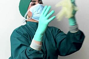 Nurse Teases Patient With Latex Gloves