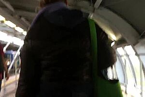 Chubby Girl's Brown Nylon Jacket Touched Candidly on Street