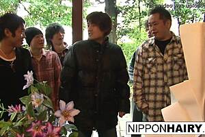 Japanese girl fingers pussy while boys watch