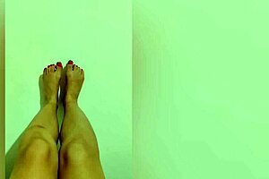 this shy teen with red pedicure is showing off her sexy legs and feet on camera