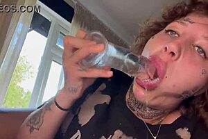 tatted girl gives rough blowjob until she cries, then sucks dildo