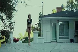 Blonde pornstar engages in fingering and masturbation with toys