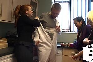 In a brutal femdom session, two mature amateurs and an asian woman jerk off a small cock fellow.