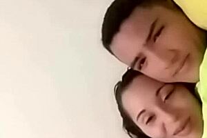 Intimate Moments Between a Charming Couple in Bed