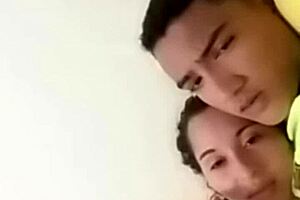 Intimate Moments Between a Charming Couple in Bed