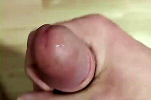 young 18+ amateur strokes cock solo in detailed massage session.